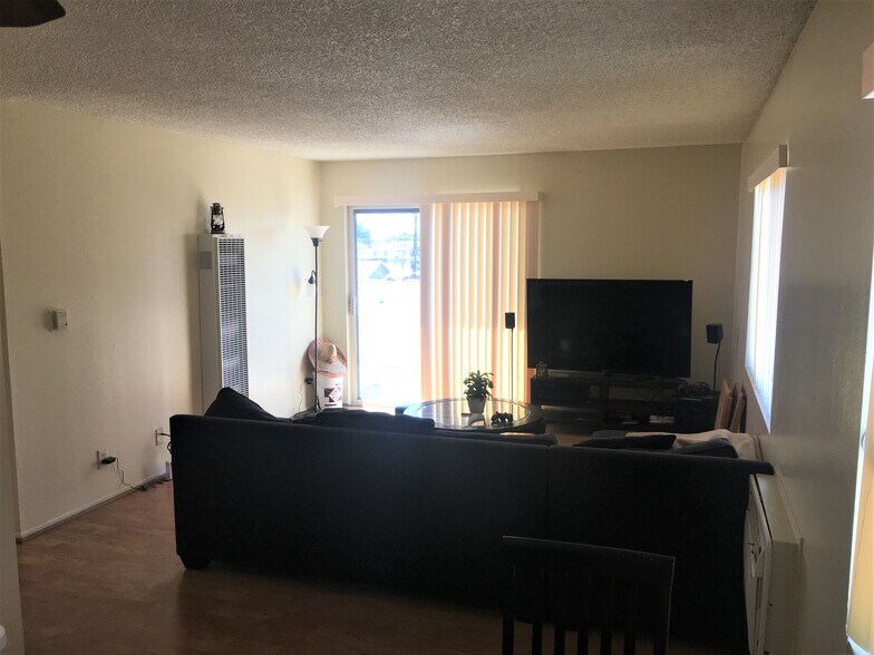 living Room with Balcony exit/entrance - 1704 S Pacific Ave