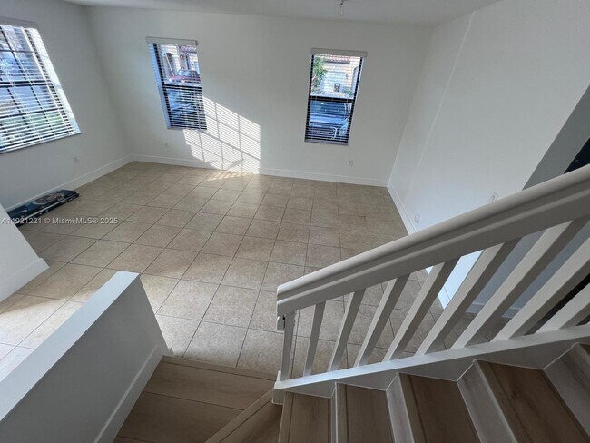 Building Photo - 9399 W 33rd Ln