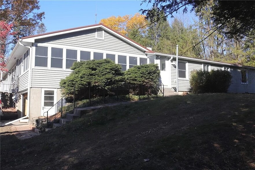 Side of main house, entrance of back area - 281 Lake Rd