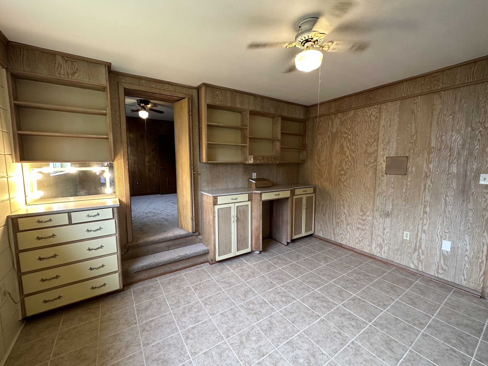3rd bedroom with tile floor and built in cabinets - 353 E Airport Ave