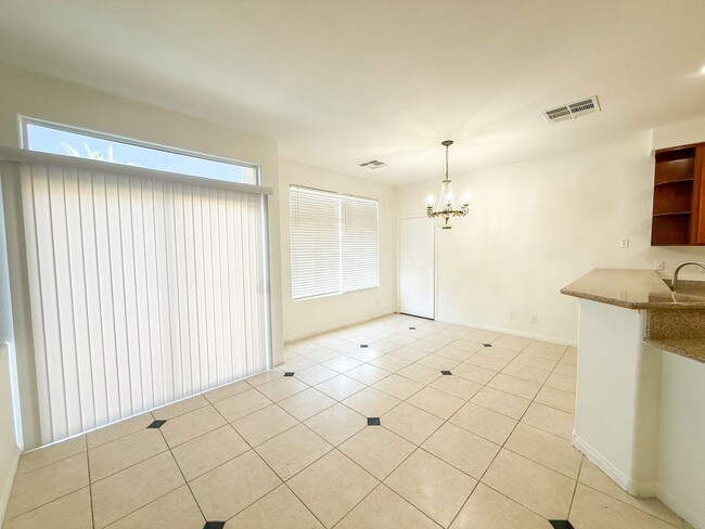 Building Photo - SPACIOUS HOME IN GATED COMMUNITY WITH POOL, RV PARKING & 4-CAR GARAGE!