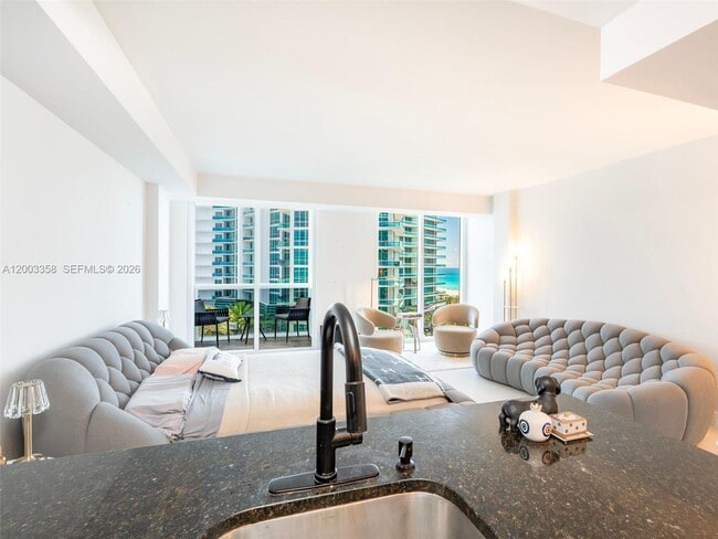 Building Photo - 10275 Collins Ave