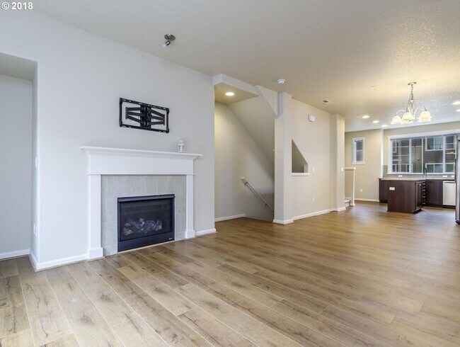 Building Photo - Neat and Tidy Newer Town Home with Two Master Bedrooms and Den on the Main Level