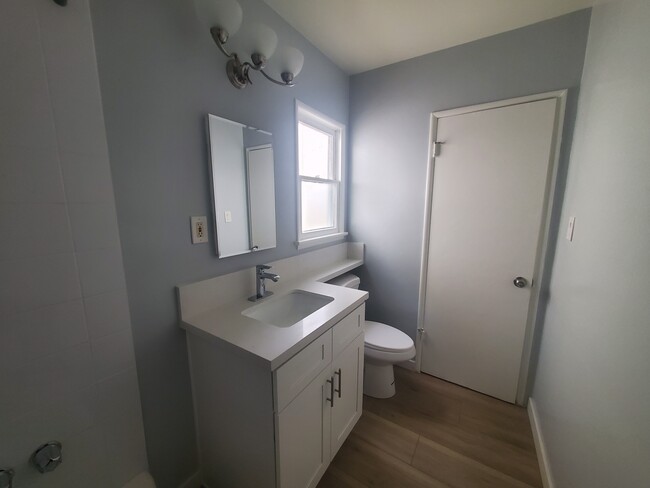 Bathroom w custom countertop over toilet - 13525 Burbank Blvd