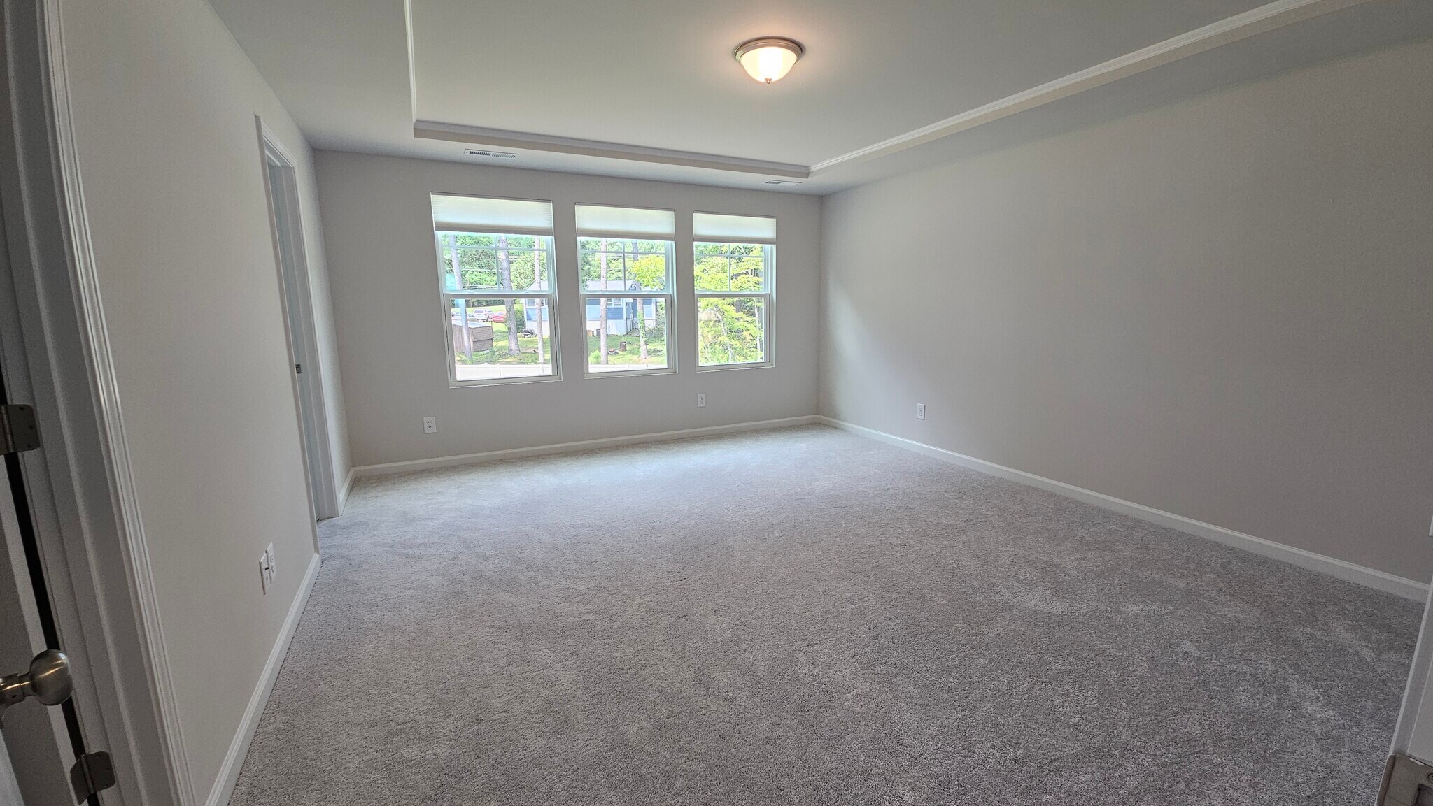Main Bedroom - entrance to closet and Main Bathroom to the right - 2207 Cape May Ln