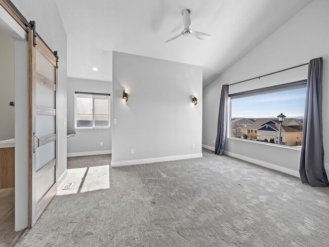 Building Photo - 4-Bedroom Townhome with Finished Basement, Garage & Private Outdoor Space