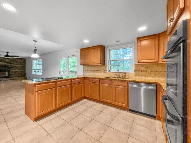Building Photo - 5-Bed, 2.5-Bath Home with Deck & Covered P...