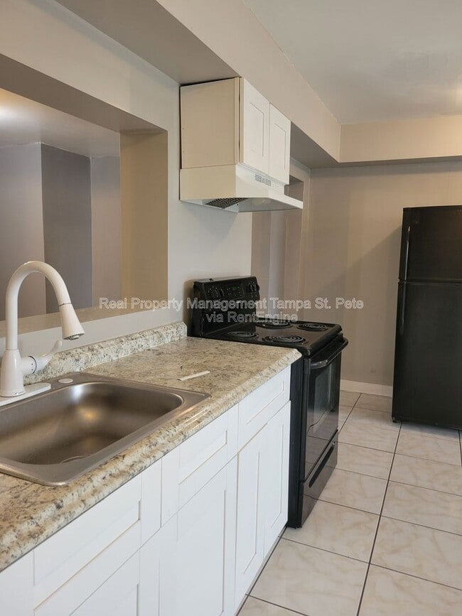 Building Photo - 4519 N Habana Ave