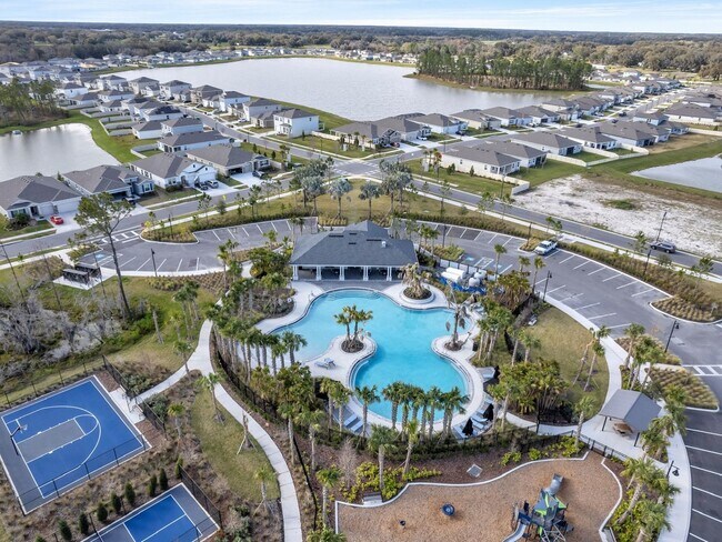 Building Photo - Stunning 4-Bedroom Home with Pond Views in...