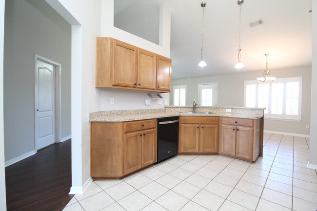 Building Photo - Updated 4BR Home Near NAS - Split Floor Pl...