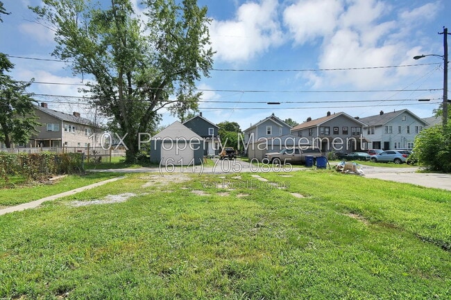 Building Photo - 1311 E 24th Ave