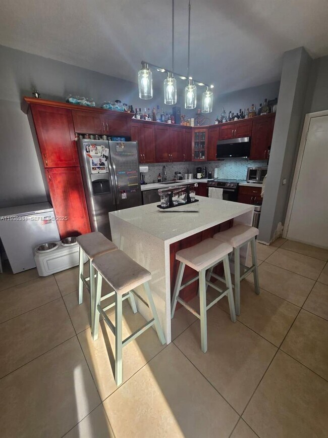 Building Photo - 9727 Hammocks Blvd