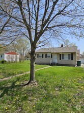 Building Photo - 1217 W 63rd Ave
