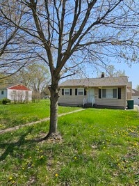 Building Photo - 1217 W 63rd Ave