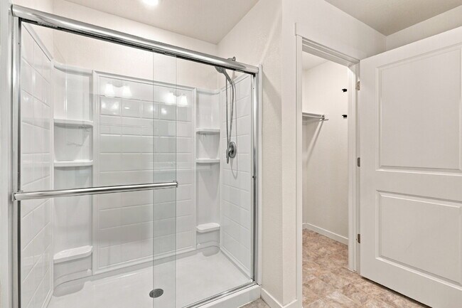 Building Photo - Spacious 4 Bedroom, 2.5 Baths in Bennett! 3 Car Attached Garage. Corner Lot!