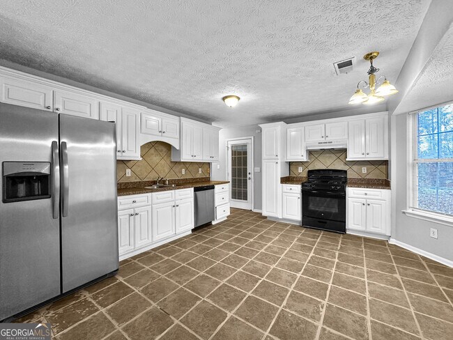 Building Photo - 7011 Grinder Dr