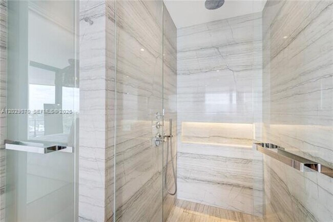 Building Photo - 8701 Collins Ave