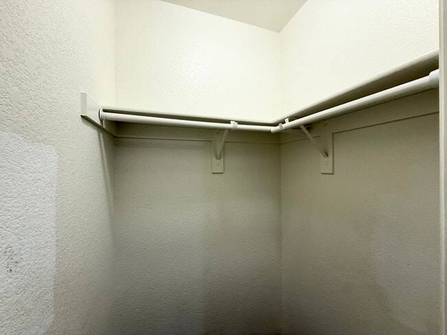 Building Photo - $500 OFF 1ST MONTHS RENT Updated 3-Bedroom Townhome in Gated Community with Pool Access
