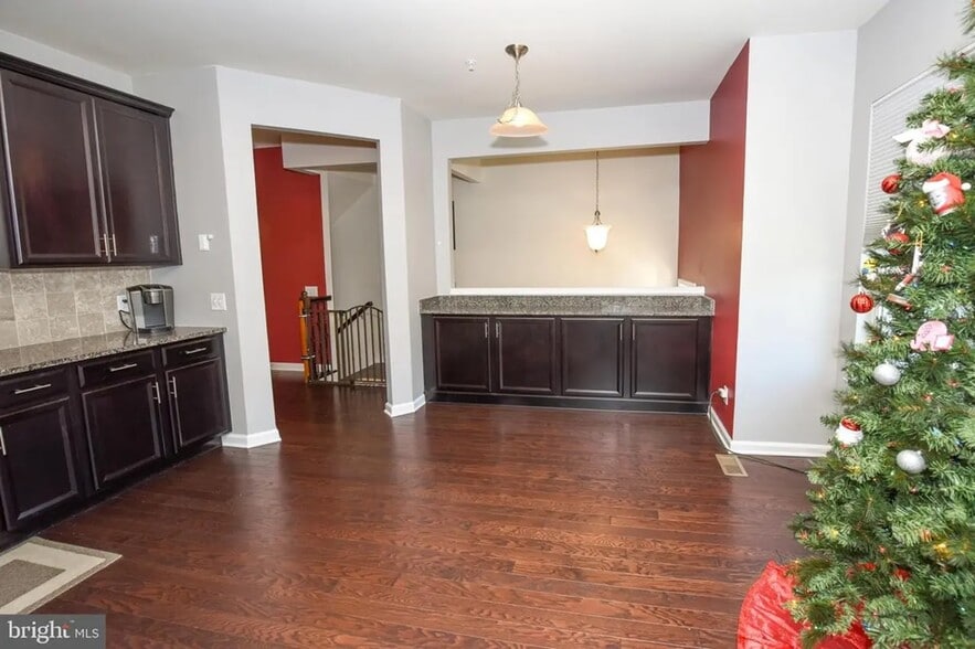 Large kitchen with ample counter space and eat-in versatility—allowing the adjoining living area to - 1736 Beacon Ln