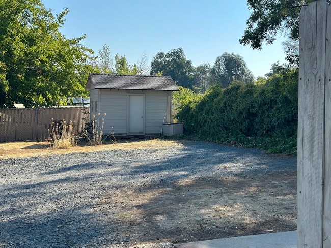 Building Photo - Welcome to this charming, newly remodeled rustic property offering privacy, comfort, and character.