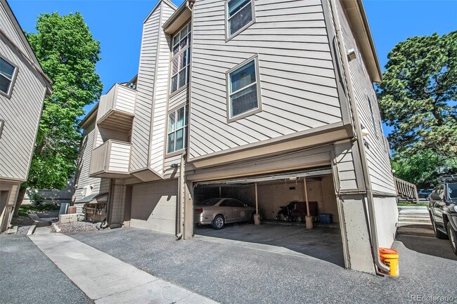 Shared detached garage. You will have the space on the right. - 701 Harlan St