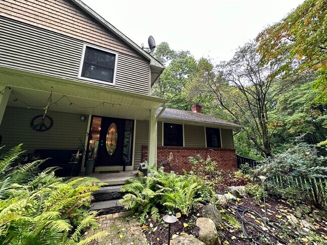 Building Photo - Dream Home in Highland, Michigan: Your Private Oasis on 5 Wooded Acres