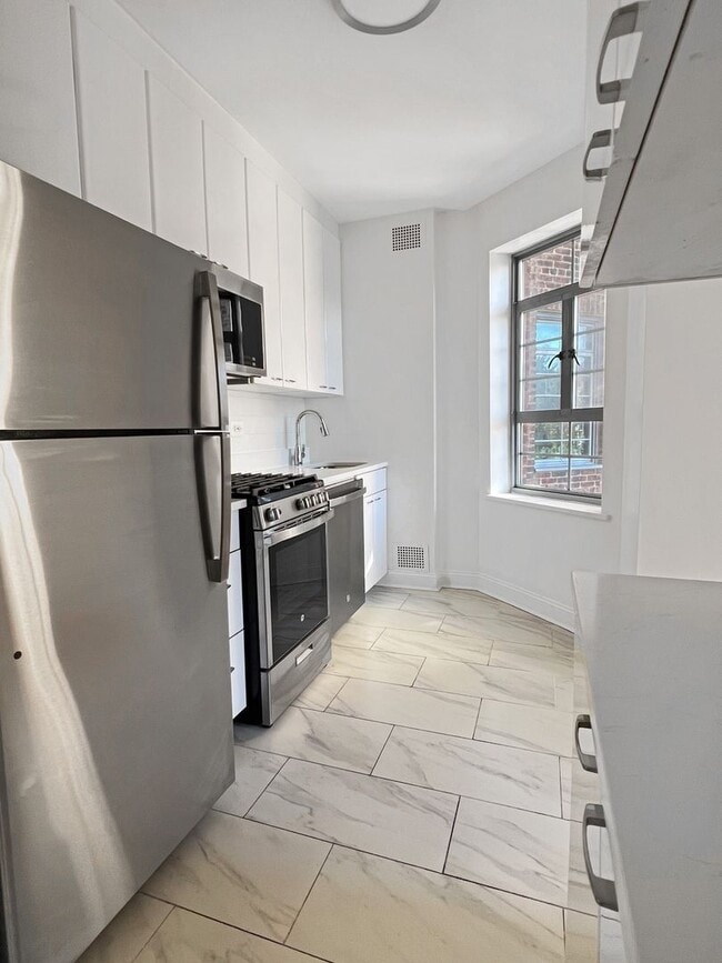 Building Photo - The Leslie — A Private Garden Enclave for the Modern New Yorker