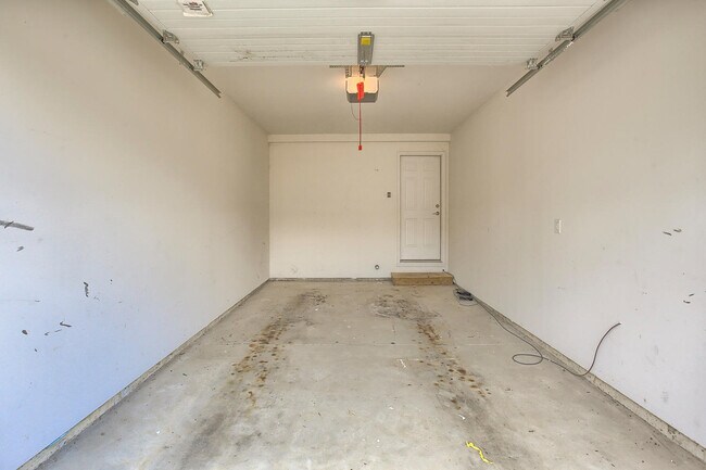 Attached one car garage - 304 Windwood Ct