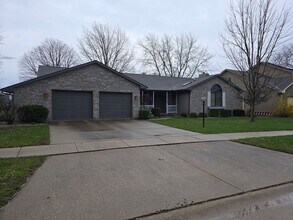 Building Photo - Charming Brick Ranch with Serene Pond Views