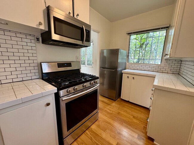 Building Photo - Discover Your Private Cottage Oasis! a must-see!