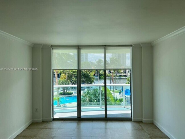 Building Photo - 19390 Collins Ave