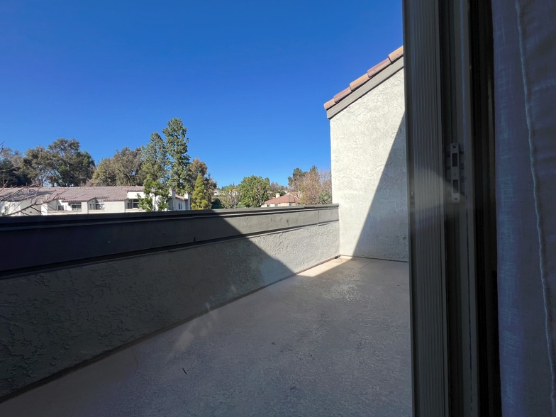 Balcony overlooking pool - 8 Town and Country Rd