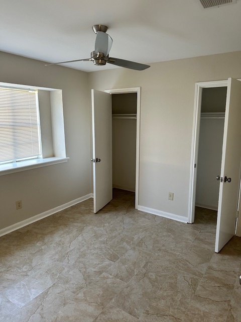 One of two secondary bedrooms. Tile flooring throughout - 128 Dallas St