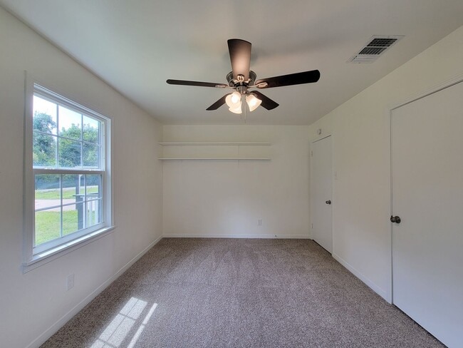 Building Photo - REMODELED 4 BEDROOM 2 BATH LEASE HOME IN A...