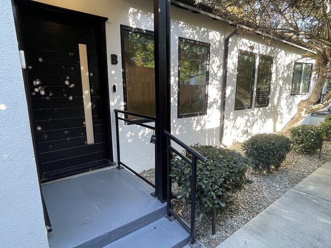 Front door to unit with Nest Doorbell with app access - 3211 W Alameda Ave