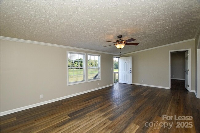 Building Photo - 711 W C J Thomas Rd