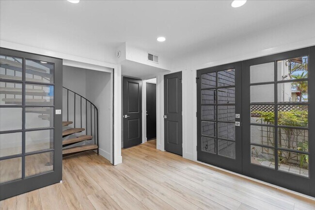 Building Photo - COMPLETELY REMODELED, BRIGHT & AIRY, TRI-LEVEL HOME W/ TOP-FLOOR GREAT ROOM LIVING SPACE, 2-CAR G...