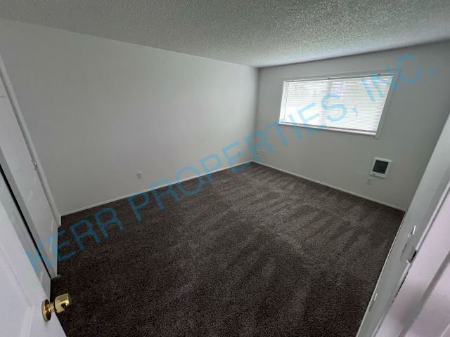 Building Photo - Cozy 2-Bedroom Duplex with Fireplace Charm...