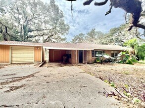 Building Photo - Enjoy the peace and quiet in this secluded home located on private lake!!!