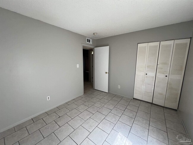 Building Photo - 6809 Tiki Ln