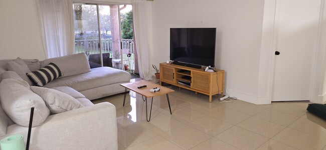 Living area with balcony - 10650 SW 157th Ct