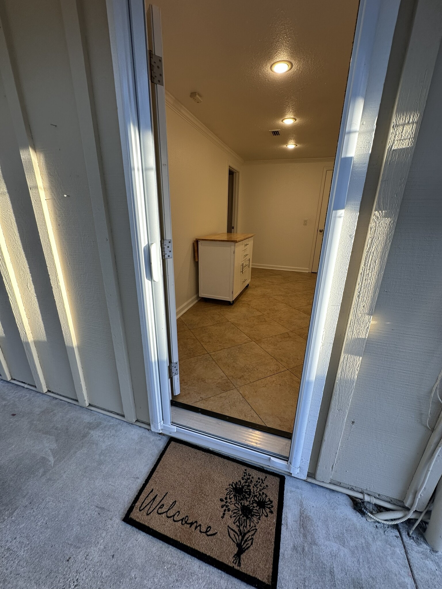 View from the patio looking in the front door. Built in screen. - 152 Redfield Ave