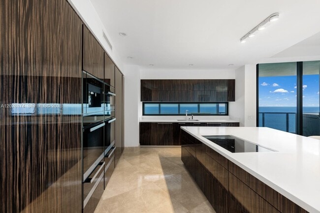 Building Photo - 18555 Collins Ave