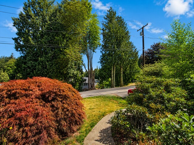 Building Photo - Beautiful Split-Level Home with Fireplace, Deck, Garage, and EV Charger