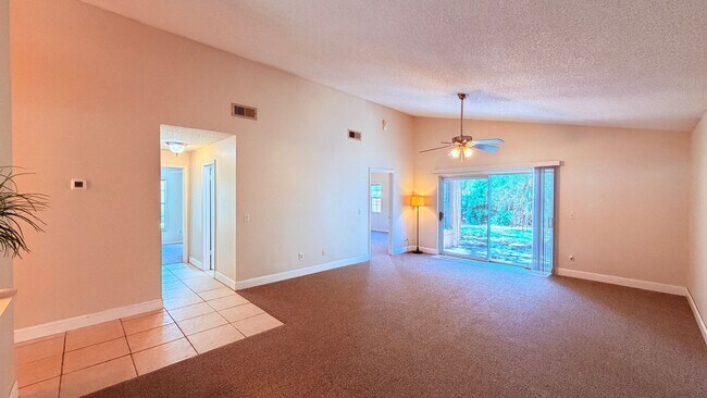 Building Photo - Bright 3/2 Home Near UCF with Vaulted Ceilings & Spacious Backyard!