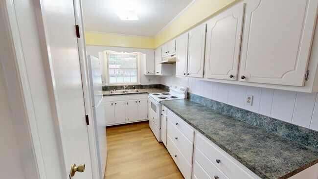 Building Photo - Updated Brick Home MINUTES From Cape Fear Valley & Fort Bragg!