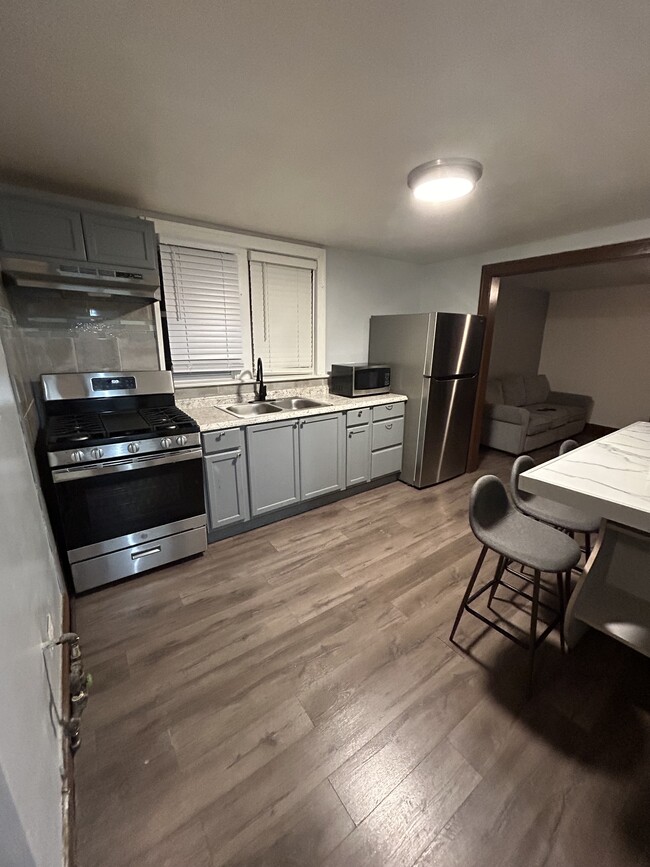 Kitchen/dining area. Stove, microwave and fridge included - 2729 S Karlov Ave