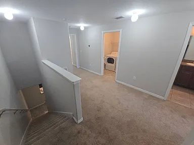 Building Photo - Spacious Townhome with Pond Views | 3BR + Loft + Screened Patio