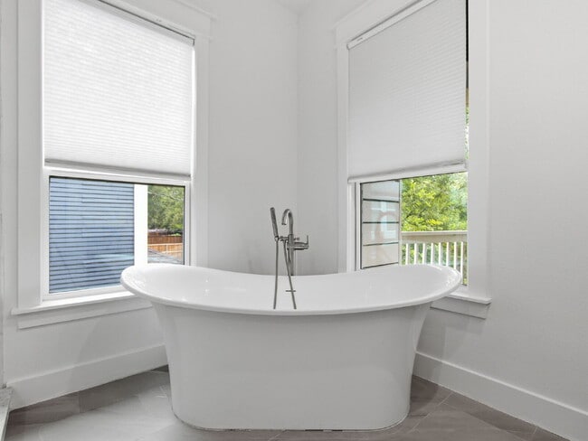 Building Photo - "Elegant 4-Bedroom 2.5-Bath Victorian Charm Meets Modern Luxury!"