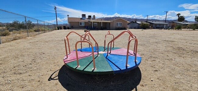 Building Photo - 74242 Pinon Dr